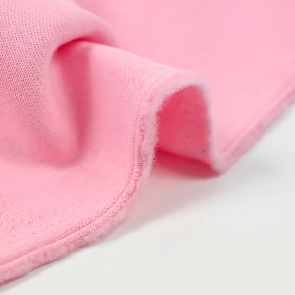 Tissu sweat minkee épais rose clair - Image 4