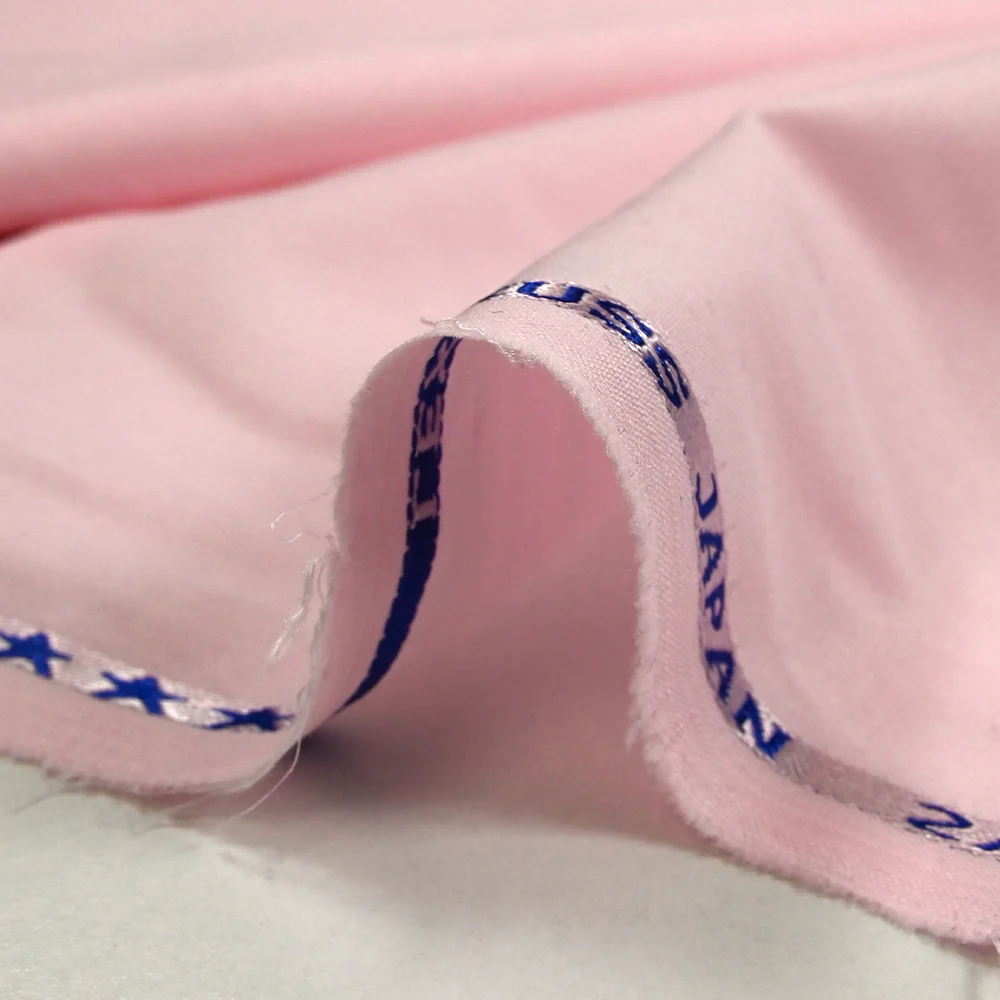 Tissu tailleur en polyester rose layette - Image 6