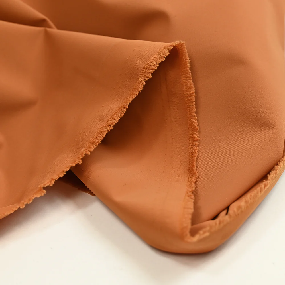Toile polyester extensible orange brûlé - Image 4