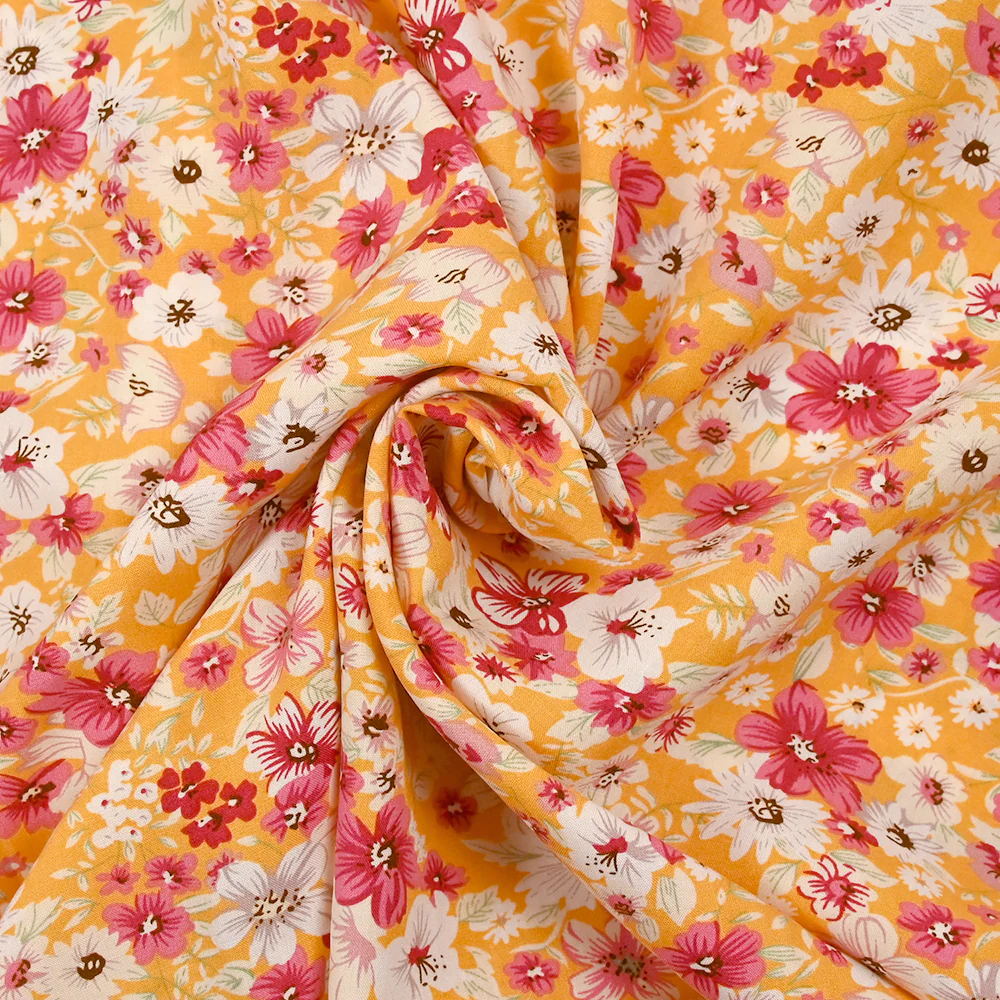Viscose imprimée fleurs d'été fond abricot - Image 2