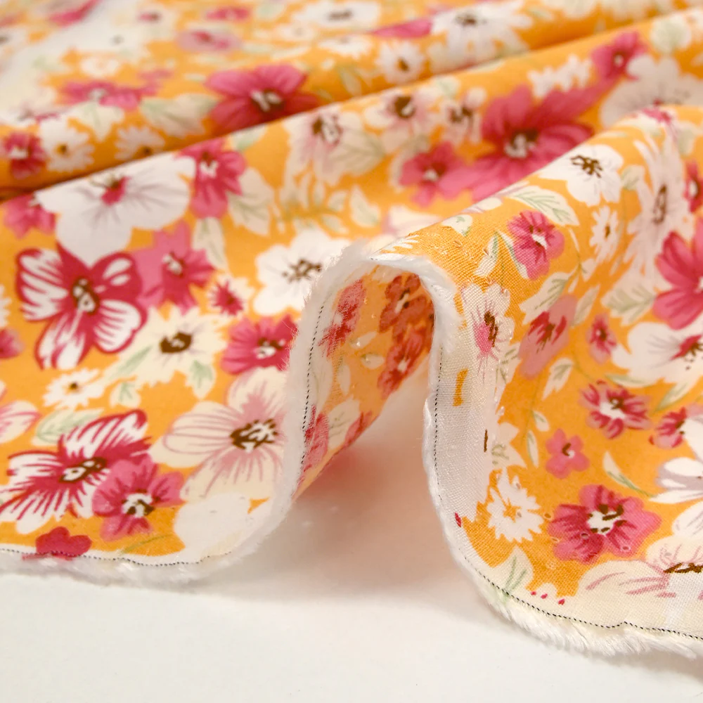 Viscose imprimée fleurs d'été fond abricot - Image 6