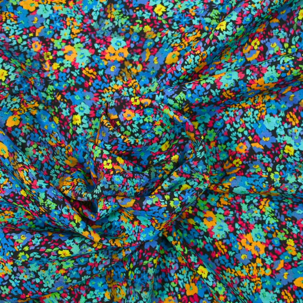 Viscose imprimée petites fleurs bleues et curry fond noir - Image 2