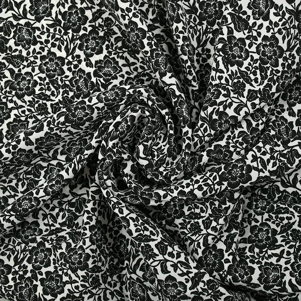 Viscose imprimée stretch fleurs noir fond blanc - Image 2
